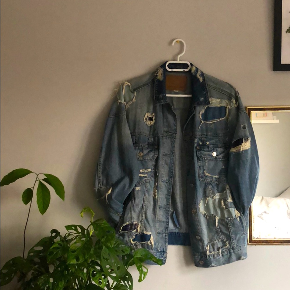 Distressed jean jacket